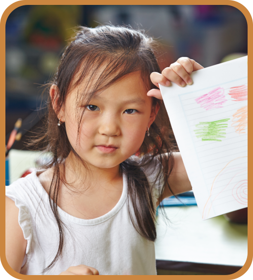 girl showing her drawing
